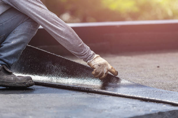 Professional Basement Waterproofing technician working in Woodridge, IL